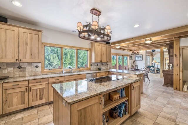 kitchen featuring an inviting chandelier, sink, hanging light fixtures, beamed ceiling, and a kitchen island