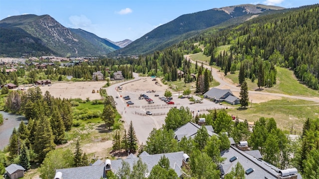 1207 W Keystone Rd Unit 2701, Keystone, CO 80435 - aerial view of residential area with a mountainous background and a heavily wooded area