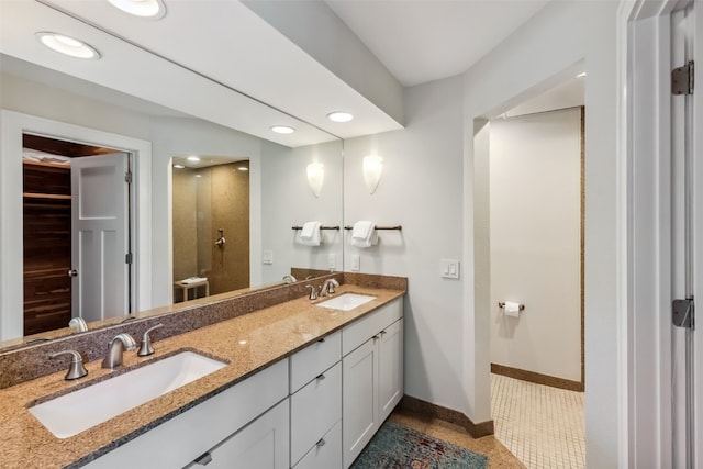 1207 W Keystone Rd Unit 2701, Keystone, CO 80435 - bathroom featuring double vanity, recessed lighting, and tile patterned flooring