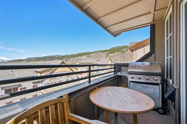 balcony featuring area for grilling and a mountain view