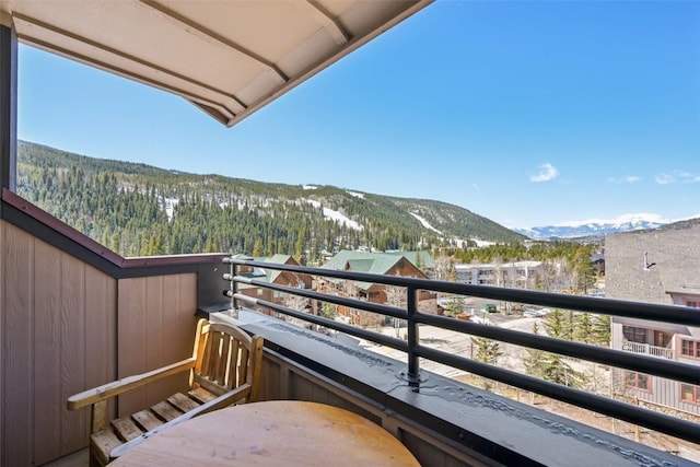 balcony featuring a mountain view