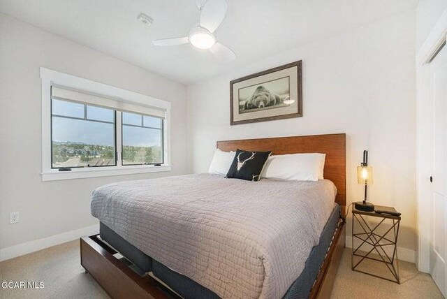 78311 US Highway 40 Unit 6, Winter Park, CO 80482 - carpeted bedroom featuring baseboards, a closet, and ceiling fan