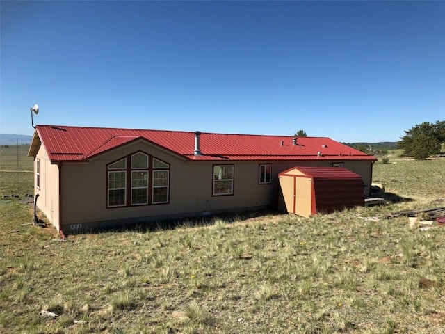 back of property with metal roof