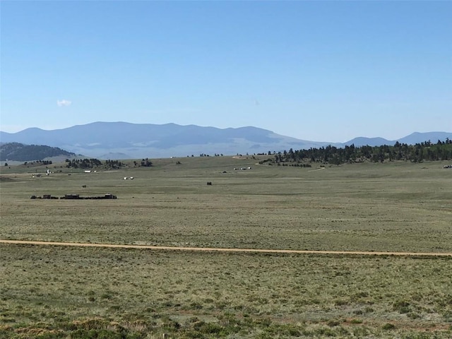 property view of mountains with a rural view