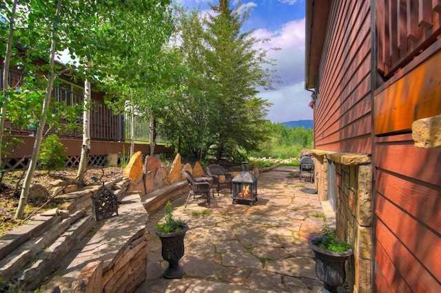 432 Bighorn Cir, Silverthorne, CO 80498 - view of patio featuring a fire pit