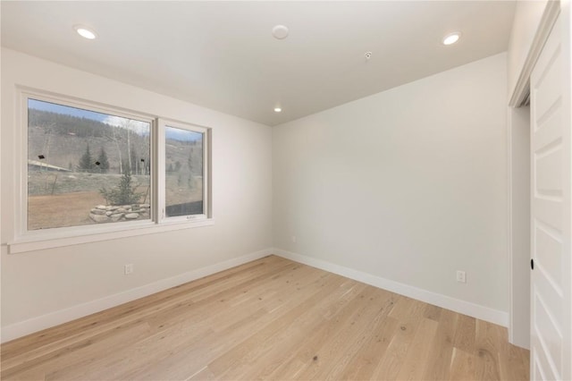 35 Argentine Ct Unit 303, Keystone, CO 80435 - empty room with light wood-type flooring and recessed lighting