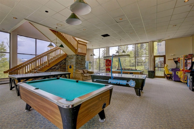 game room with a wall of windows, carpet floors, and pool table