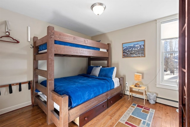 bedroom with wood finished floors