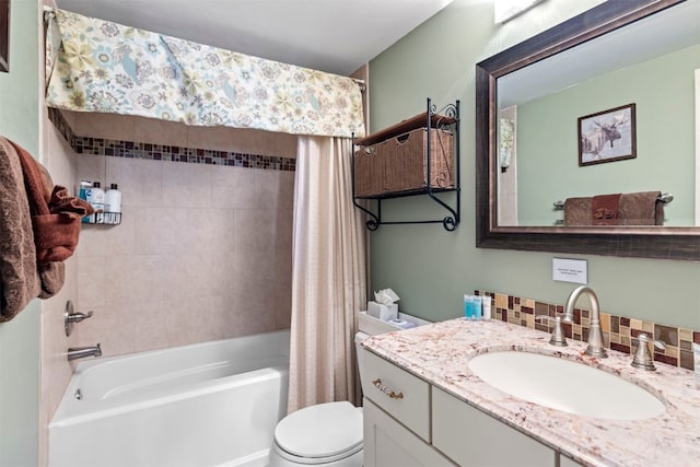 bathroom with shower / bath combo, toilet, and vanity