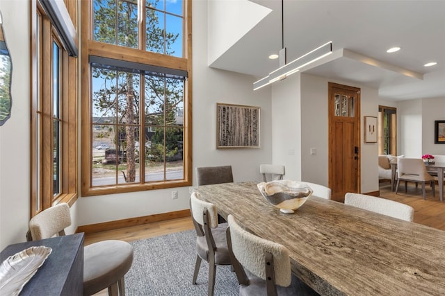 317 Granite St Unit 5, Frisco, CO 80443 - dining room with wood finished floors, recessed lighting, and baseboards