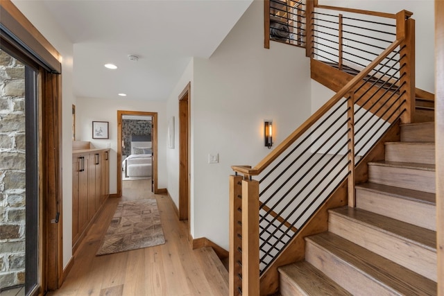 317 Granite St Unit 5, Frisco, CO 80443 - stairway featuring wood finished floors, recessed lighting, and baseboards