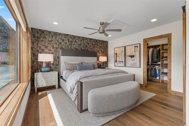 317 Granite St Unit 5, Frisco, CO 80443 - bedroom with wood finished floors, recessed lighting, a walk in closet, a closet, and ceiling fan