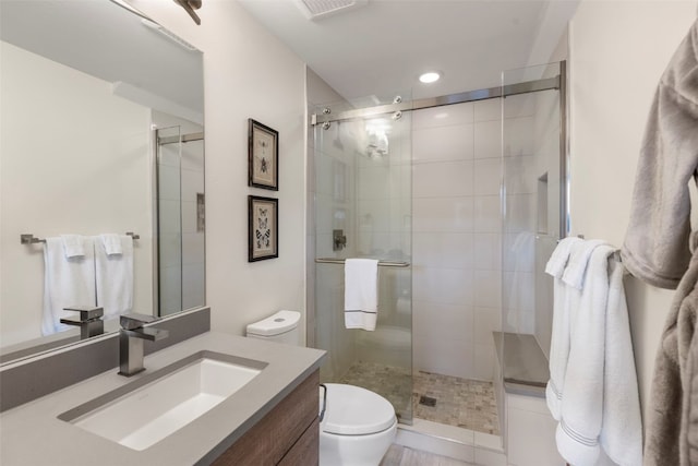 317 Granite St Unit 5, Frisco, CO 80443 - full bath with toilet, vanity, a shower stall, and recessed lighting