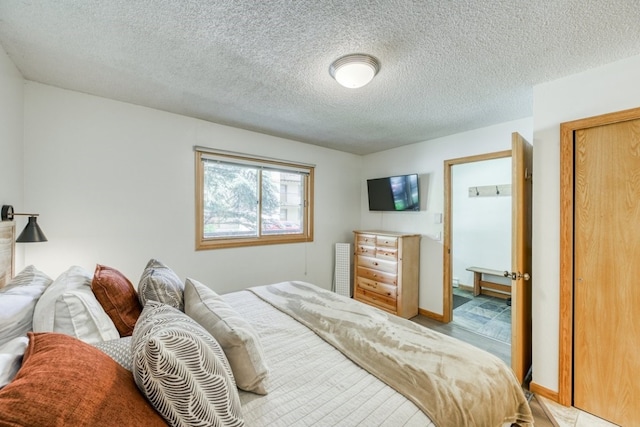 23004 US Highway 6 Unit 103, Keystone, CO 80435 - bedroom featuring a textured ceiling