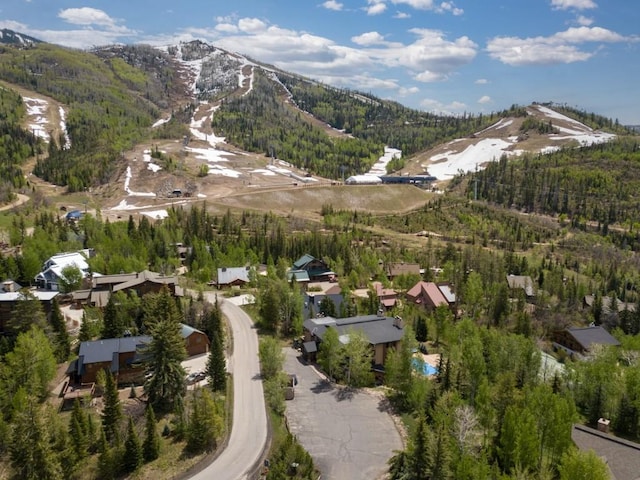 2883 Burgess Creek Rd Unit 203, Steamboat Springs, CO 80487 - aerial overview of property's location featuring mountains and a heavily wooded area