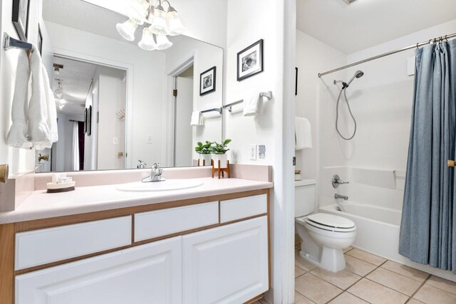 2883 Burgess Creek Rd Unit 203, Steamboat Springs, CO 80487 - carpeted bedroom featuring baseboards, a baseboard heating unit, and a textured ceiling