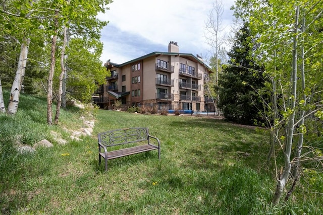 2883 Burgess Creek Rd Unit 203, Steamboat Springs, CO 80487 - view of property's community featuring a yard