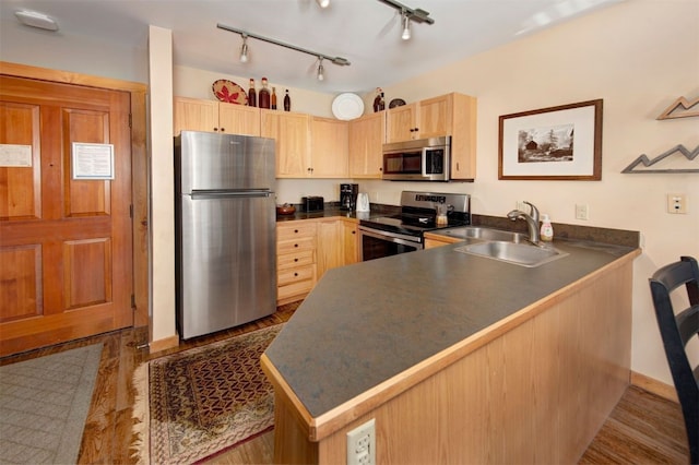 100 Dercum Sq Unit 8342, Keystone, CO 80435 - kitchen featuring dark countertops, light brown cabinets, a sink, and appliances with stainless steel finishes