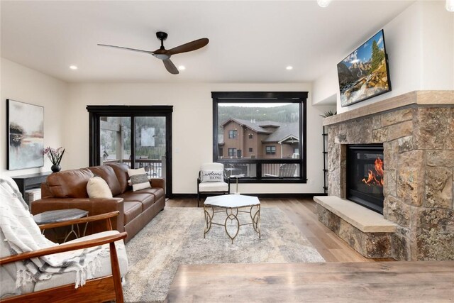750 Independence Rd Unit 2C, Keystone, CO 80435 - living area featuring ceiling fan, a fireplace, wood finished floors, and recessed lighting