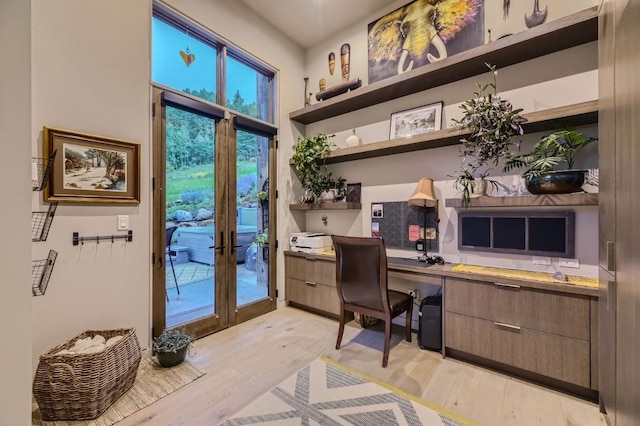 313 Raven Golf Ln, Silverthorne, CO 80498 - office featuring built in study area and light wood-style flooring