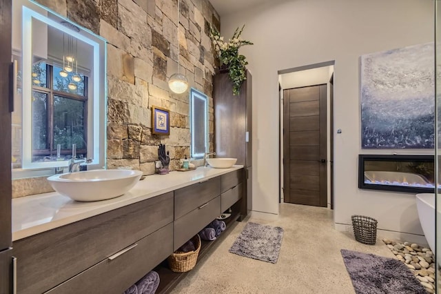 313 Raven Golf Ln, Silverthorne, CO 80498 - full bathroom with double vanity and a soaking tub