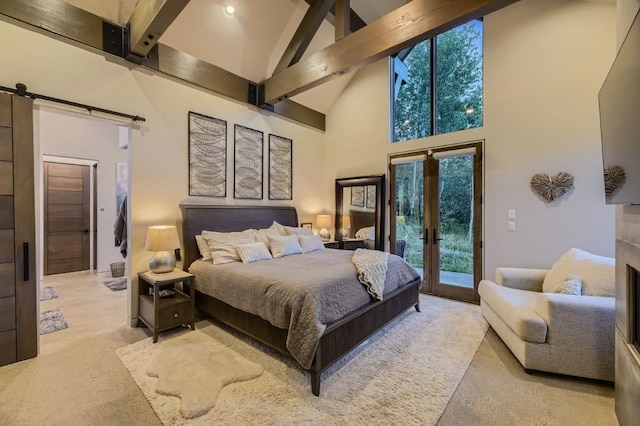 313 Raven Golf Ln, Silverthorne, CO 80498 - carpeted bedroom featuring a barn door, access to outside, high vaulted ceiling, beam ceiling, and multiple windows