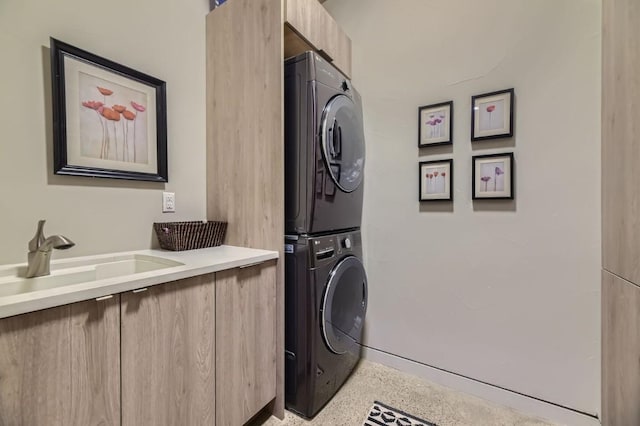 313 Raven Golf Ln, Silverthorne, CO 80498 - laundry room featuring stacked washer / drying machine