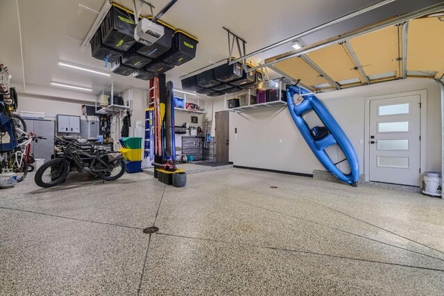 313 Raven Golf Ln, Silverthorne, CO 80498 - garage featuring a garage door opener