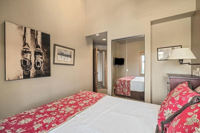 2800 Village Dr Unit 1302, Steamboat Springs, CO 80487 - bedroom featuring a high ceiling