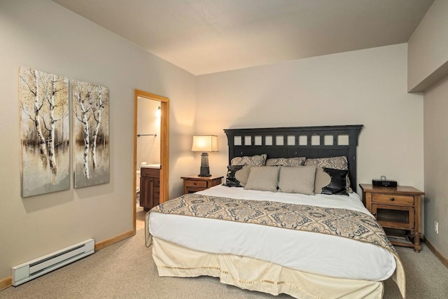 2800 Village Dr Unit 1302, Steamboat Springs, CO 80487 - carpeted bedroom with baseboard heating, baseboards, and ensuite bath