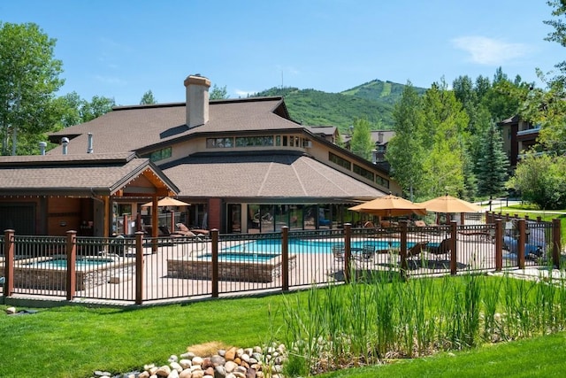 2800 Village Dr Unit 1302, Steamboat Springs, CO 80487 - community pool featuring a mountain view and a patio