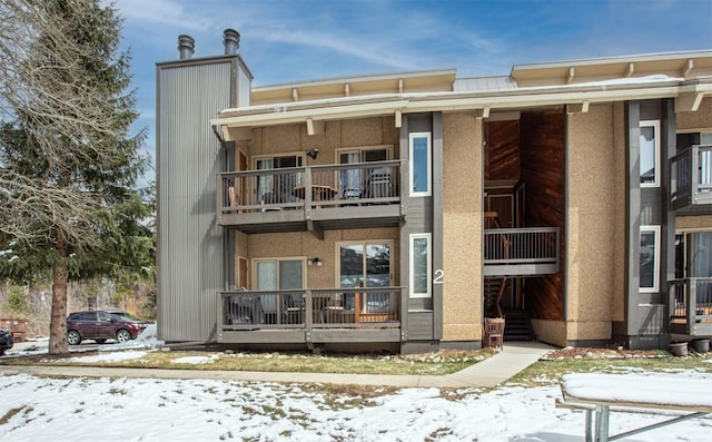 view of snow covered property