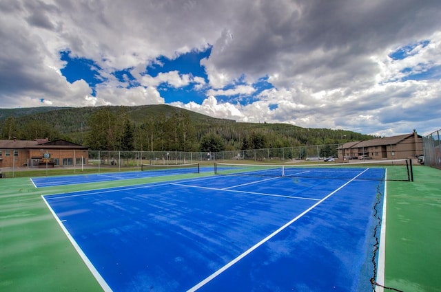 1133 Straight Creek Dr Unit 108, Dillon, CO 80435 - view of tennis court featuring a mountain view