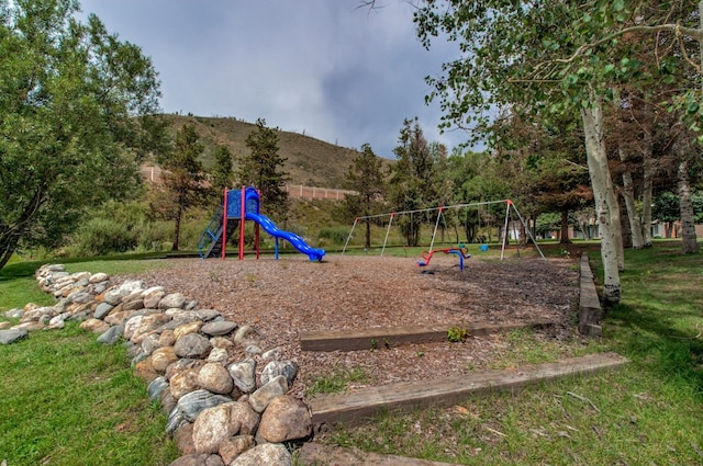 1133 Straight Creek Dr Unit 108, Dillon, CO 80435 - communal playground featuring a mountain view