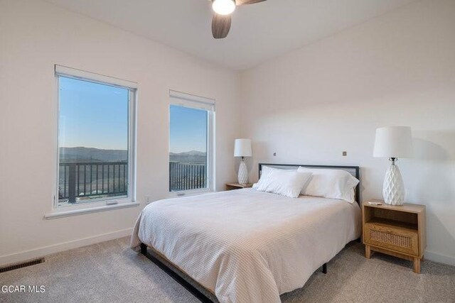 1110 Mt Neva Dr, Granby, CO 80446 - carpeted bedroom featuring baseboards, visible vents, and ceiling fan