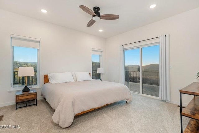carpeted bedroom with baseboards, access to outside, and recessed lighting