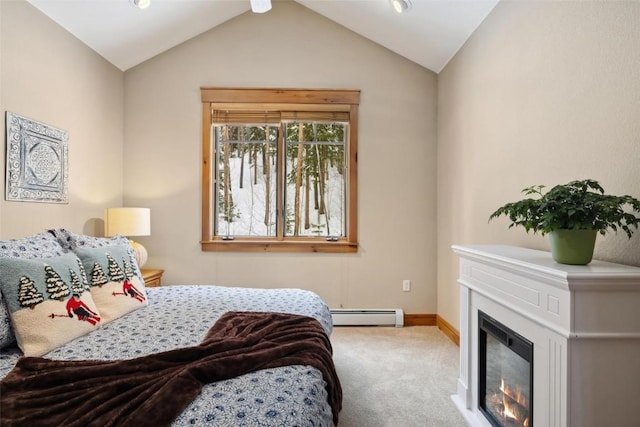 129 Tip Top Trl Unit 6543, Keystone, CO 80435 - carpeted bedroom featuring a glass covered fireplace, baseboards, lofted ceiling, and baseboard heating