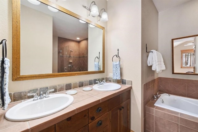 129 Tip Top Trl Unit 6543, Keystone, CO 80435 - full bath featuring a garden tub, a sink, double vanity, and a stall shower