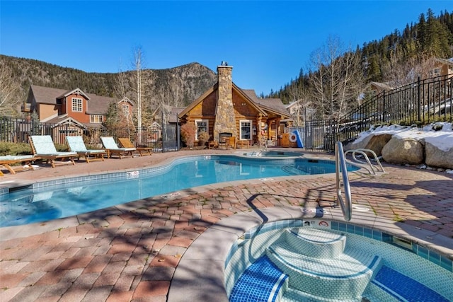 129 Tip Top Trl Unit 6543, Keystone, CO 80435 - pool with fence, a patio, and a mountain view