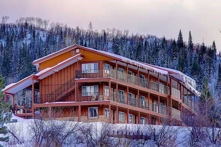 3295 Apres Ski Way Unit B10, Steamboat Springs, CO 80487 - snow covered building with a wooded view