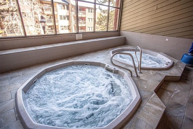 exterior space featuring an indoor hot tub