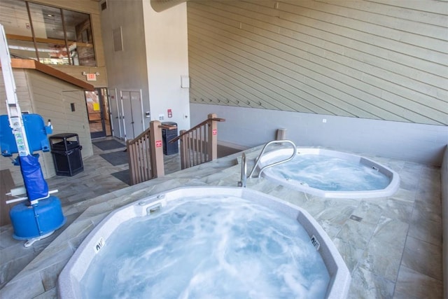 exterior space with an indoor hot tub