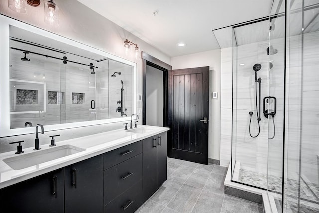 1891 Ski Hill Rd Unit 7404, Breckenridge, CO 80424 - bathroom featuring double vanity, tile patterned floors, a shower stall, and a sink