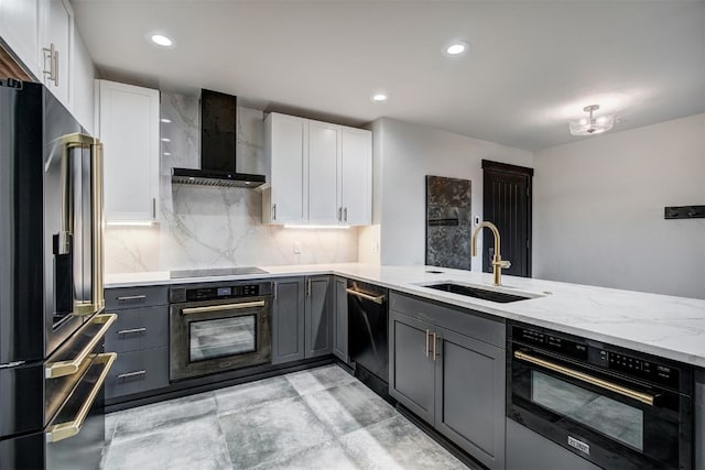 1891 Ski Hill Rd Unit 7404, Breckenridge, CO 80424 - kitchen with wall chimney range hood, gray cabinetry, light stone counters, a sink, and black appliances