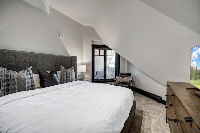 1891 Ski Hill Rd Unit 7404, Breckenridge, CO 80424 - carpeted bedroom featuring baseboards and vaulted ceiling