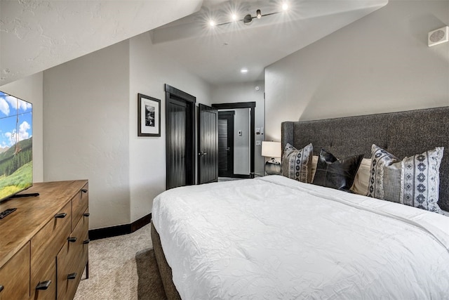 1891 Ski Hill Rd Unit 7404, Breckenridge, CO 80424 - bedroom with light colored carpet, a ceiling fan, baseboards, and visible vents