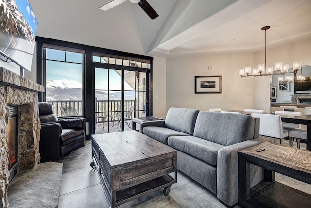 1891 Ski Hill Rd Unit 7404, Breckenridge, CO 80424 - living room with finished concrete floors, ceiling fan with notable chandelier, lofted ceiling, and a fireplace