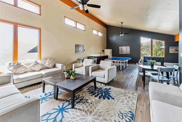 9460 Ryan Gulch Rd Unit 65, Silverthorne, CO 80498 - living room with baseboards, wood finished floors, and ceiling fan