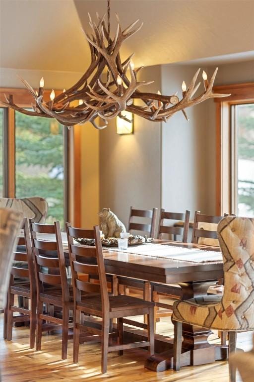 174 Sage Dr, Breckenridge, CO 80424 - dining area with a notable chandelier and wood finished floors