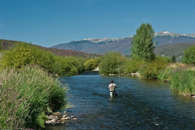 465 Four Oclock Rd Unit 105, Breckenridge, CO 80424 - water view featuring a mountain backdrop